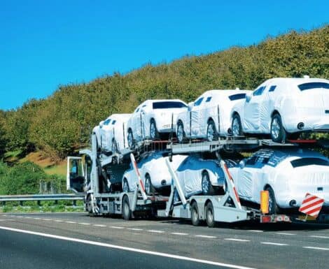 new-car-carrier-road-new-car-carrier-road-truck-transporter-131507247